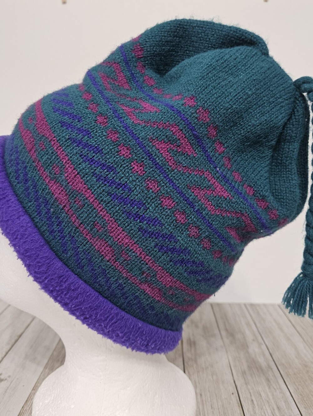 The Mews Knitted Fleece Lined Winter Beanie Hat with Braided Tassle Making Fun